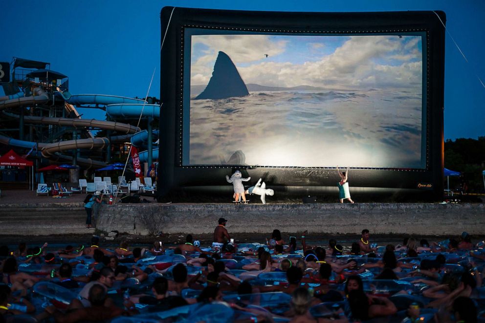 PHOTO: People watch the film "Jaws" while floating on inner tubes at Volente Beach Water Park in Leander, Texas in this undated publicity image.