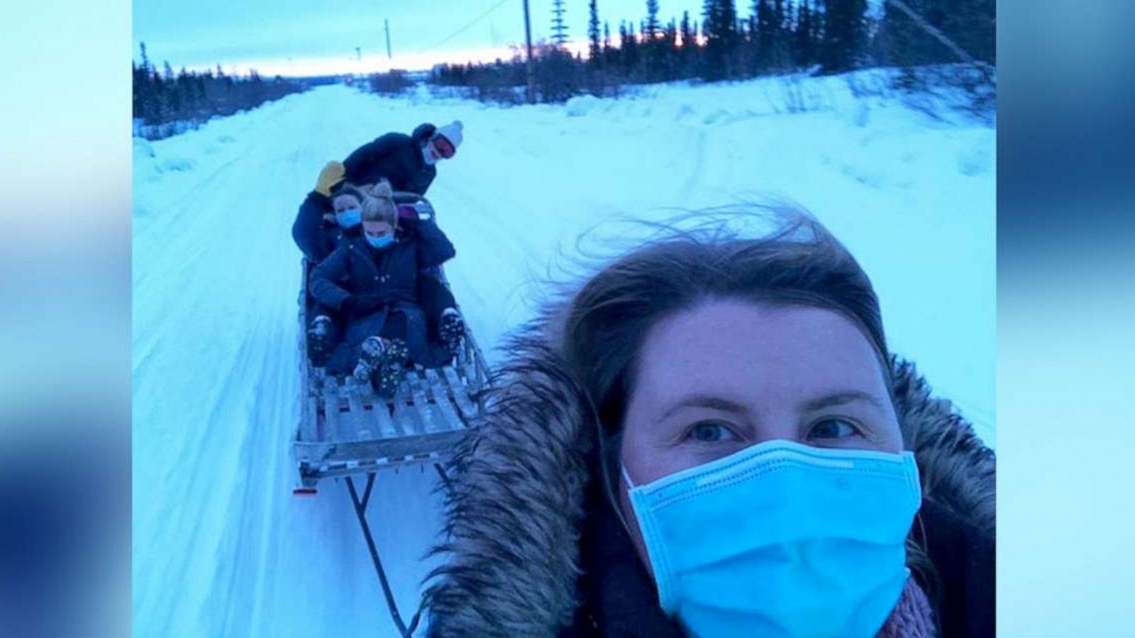 PHOTO: Dr. Katrine Bengaard and three fellow female healthcare workers deliver COVID-19 vaccines to people in rural Alaska.