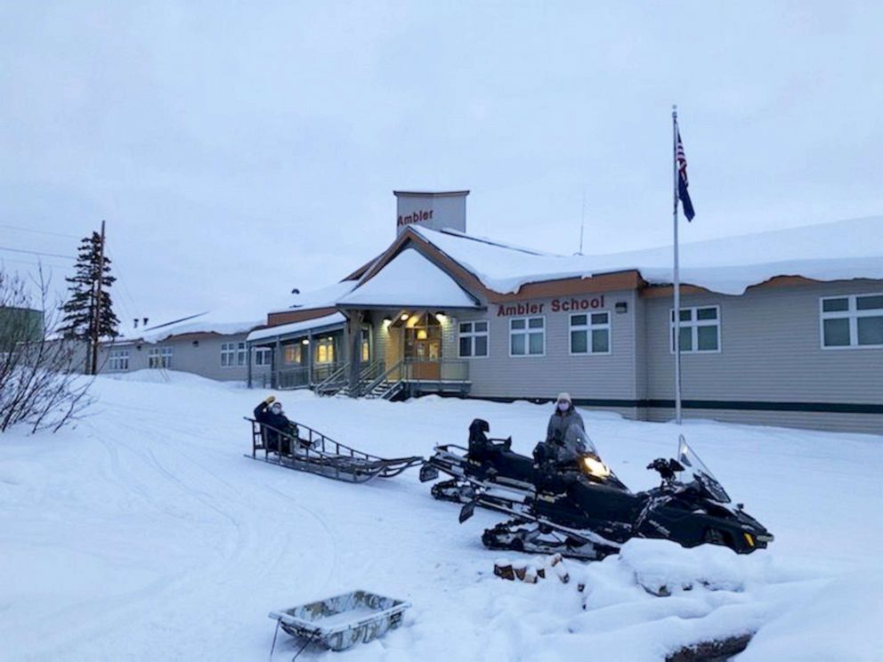 PHOTO: Dr. Katrine Bengaard and three fellow female healthcare workers deliver COVID-19 vaccines to people in rural Alaska.