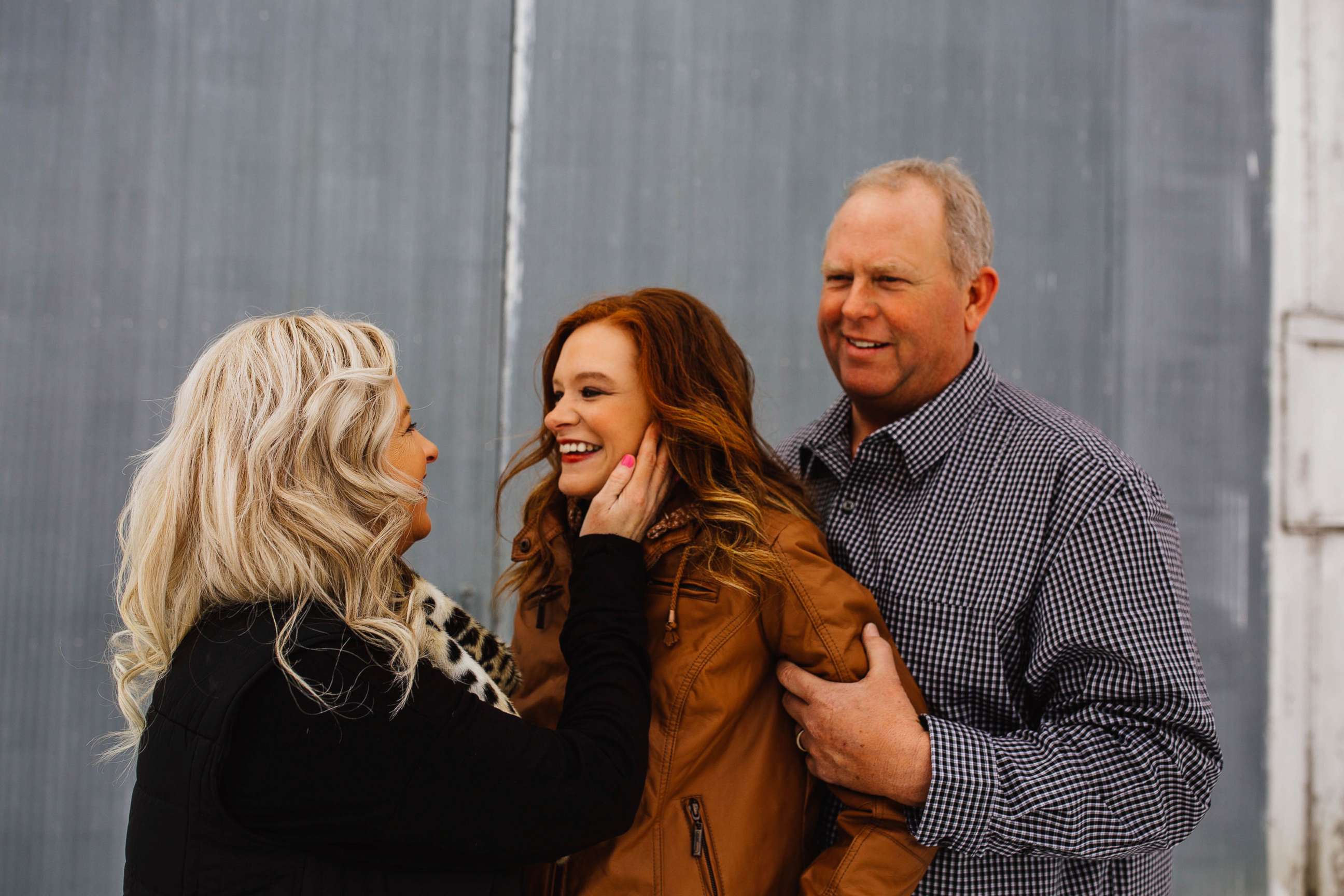 PHOTO: Jaci Hermstad, 25, is pictured with her parents, Lori and Jeff, in Webb, Iowa, March 2019.