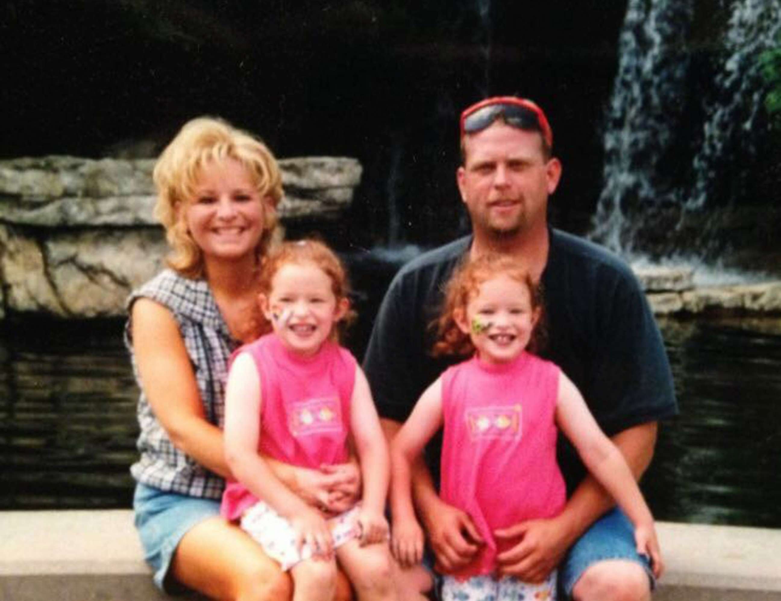 PHOTO: Lori and Jeff Hermstad poses for a photo with their daughters Jaci and Alex at the zoo in St. Louis, Mo., circa 1997.