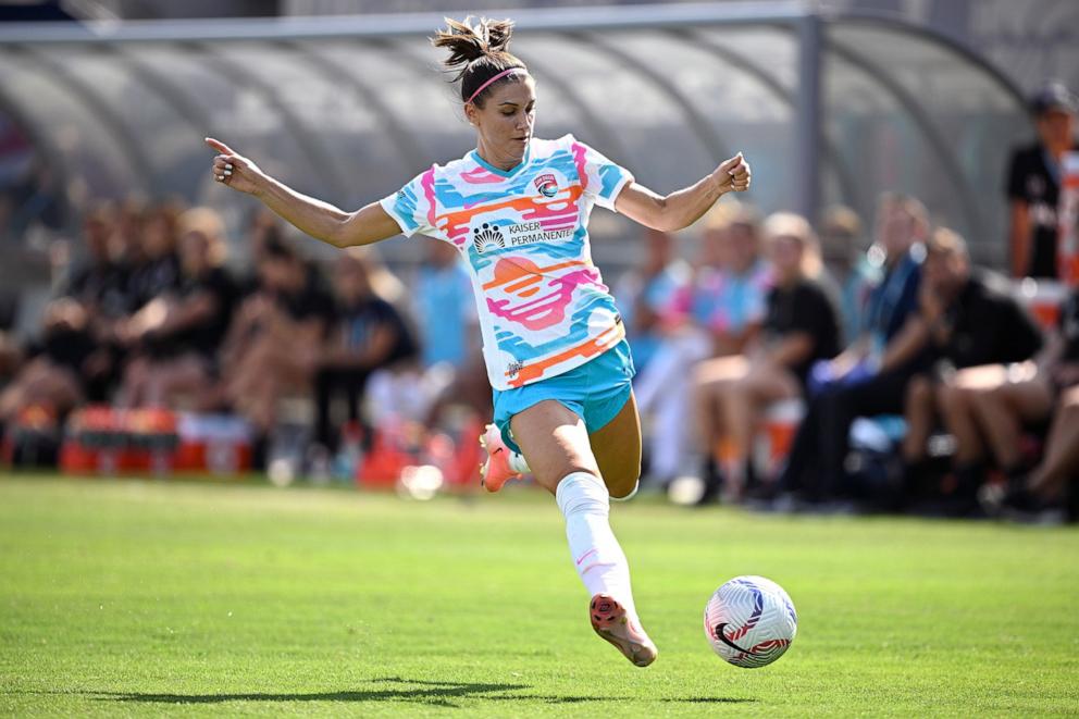 PHOTO: Alex Morgan of San Diego Wave FC passes the ball during the second half against the Angel City FC, August 24, 2024, in San Diego, Calif.