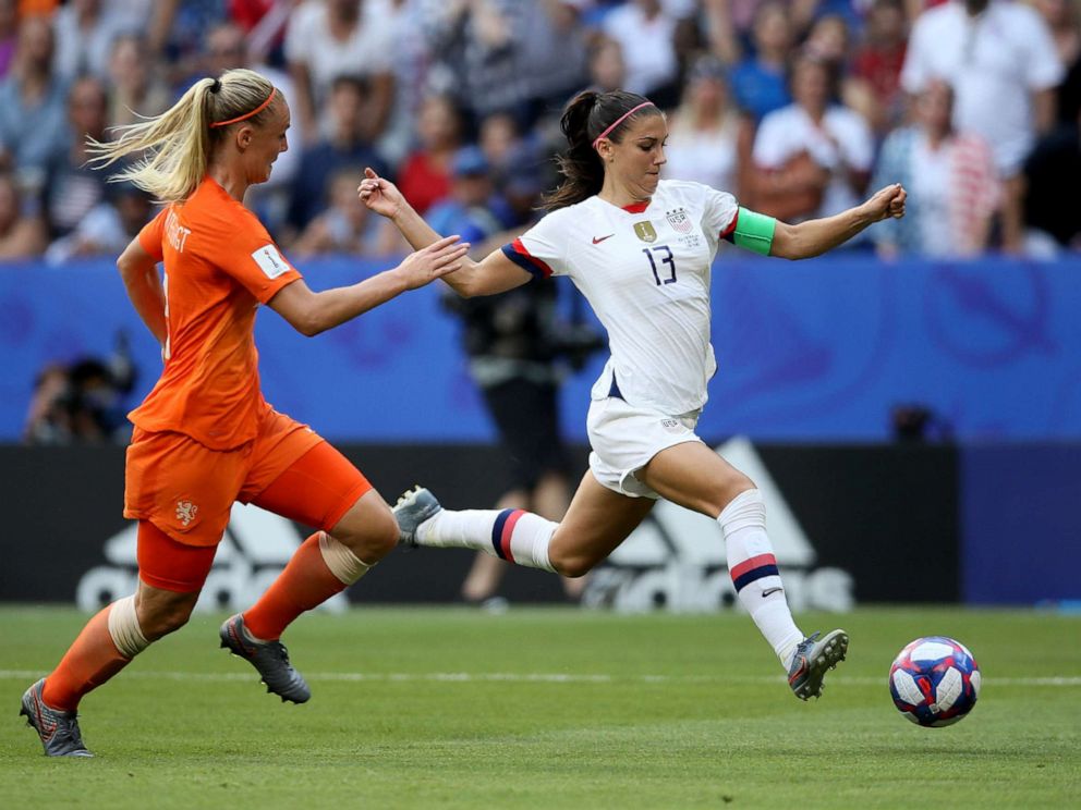 PHOTO: Alex Morgan, right, fights for the ball with Netherlands Stefanie Van Der Gragt during the Womens World Cup final soccer match between US and The Netherlands at the Stade de Lyon in Decines, outside Lyon, France, July 7, 2019.