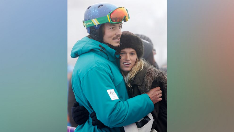 PHOTO: In this Feb. 17, 2014, file photo, Australia's Alex Pullin hugs his girlfriend Ellidy Vlug prior to a men's snowboard cross competition at the Rosa Khutor Extreme Park, at the 2014 Winter Olympics in Krasnaya Polyana, Russia.