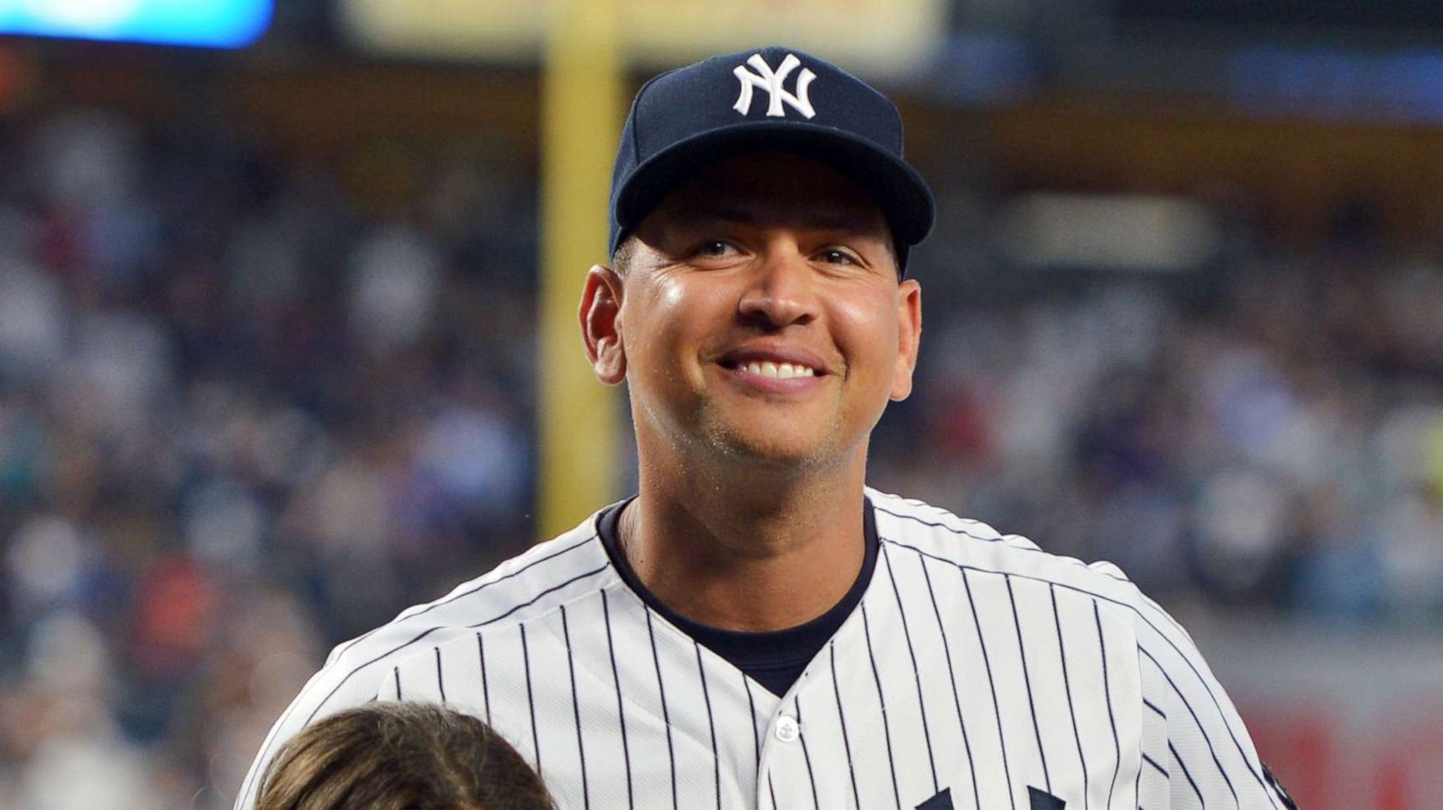 PHOTO: Alex Rodriguez, #13 of the New York Yankees, stands with his daughters Natasha and Ella during a presentation in his honor before the game against the Tampa Bay Rays at Yankee Stadium, Aug. 12, 2016, in New York City.