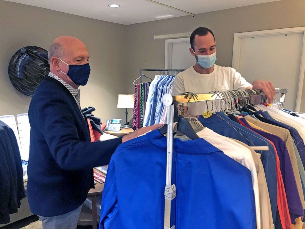 PHOTO: Matthew Trebek and Jeopardy! Costumer, Steven Zimbelman, pack Alex Trebek’s wardrobe for donation to The Doe Fund. 