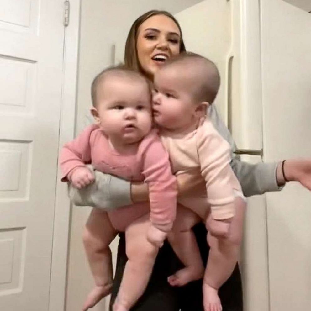 VIDEO: Petite mom has her hands full with 40 pounds of babies 