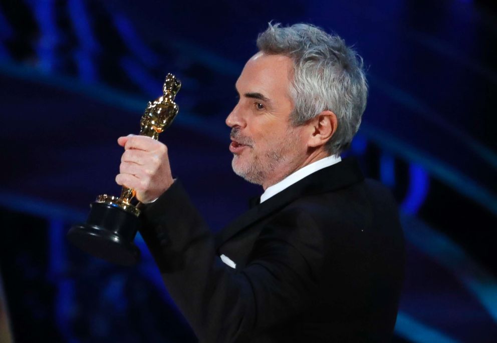 PHOTO: Director Alfonso Cuaron accepts the Best Cinematography award for "Roma," at the Oscars, Feb. 24, 2019 in Los Angeles.