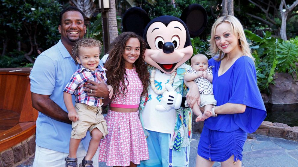 PHOTO: FILE - Actor and television host Alfonso Ribeiro and his family, Alfonso Jr., 2, Sienna, 12, Anders, 3 months, and wife Angela, meet Mickey Mouse at Aulani, a Disney Resort & Spa, July 26, 2015 on the island of Oahu in Hawaii.