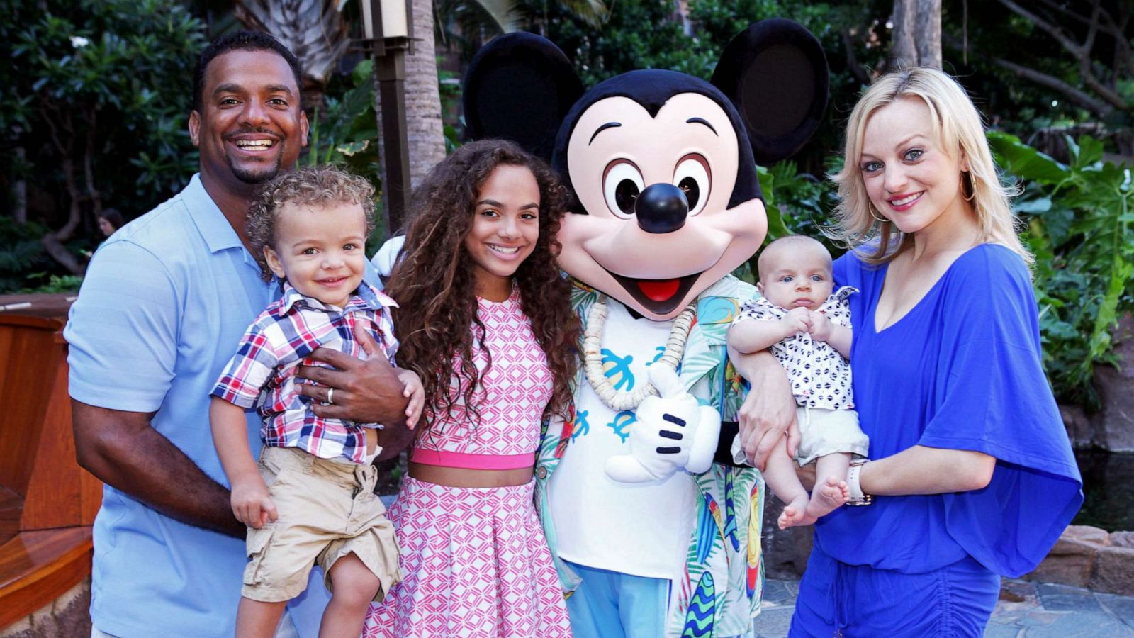 PHOTO: FILE - Actor and television host Alfonso Ribeiro and his family, Alfonso Jr., 2, Sienna, 12, Anders, 3 months, and wife Angela, meet Mickey Mouse at Aulani, a Disney Resort & Spa, July 26, 2015 on the island of Oahu in Hawaii.