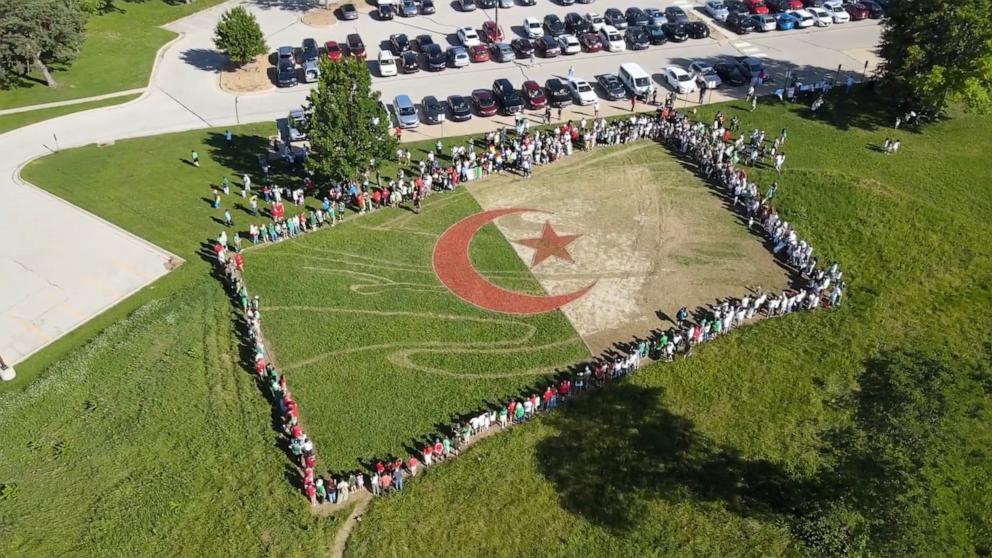 PHOTO: Artist Stan Herd created a giant Algerian flag on the grounds of the University of Kansas in honor of the Algerian team calling Lawrence, Kansas their home base during the 2026 FIFA World Cup.