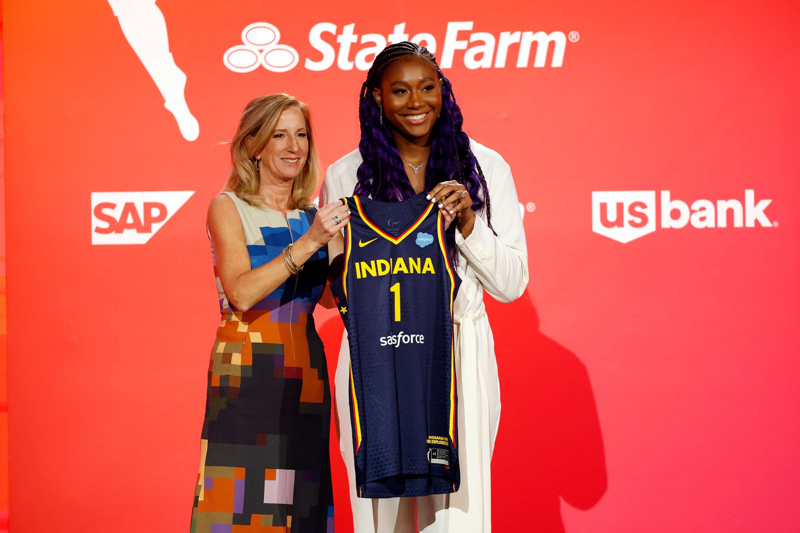 PHOTO: WNBA Commissioner Cathy Engelbert and Aliyah Boston pose for photos after Boston was drafted 1st overall by the Indiana Fever during the 2023 WNBA Draft at Spring Studios on April 10, 2023 in New York City.