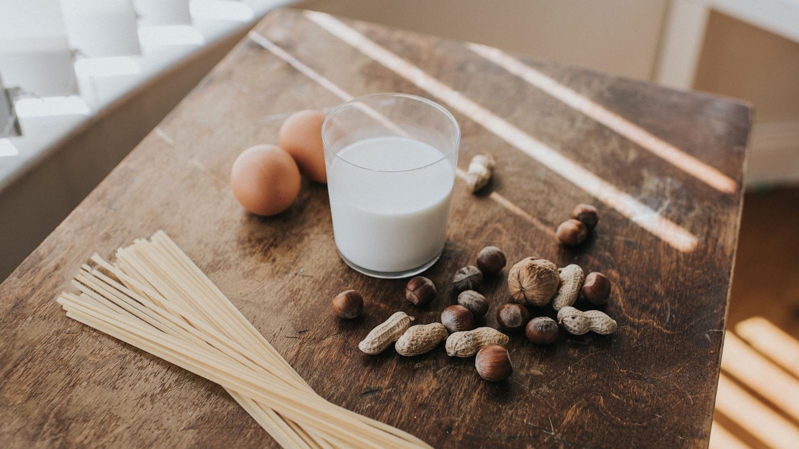 PHOTO: In this undated stock photo, a group of commonly known allergens, eggs, milk, nuts and pasta, are seen on a table.