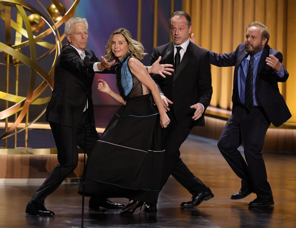 PHOTO: (L-R) Greg Germann, Calista Flockhart, Gil Bellows and Peter MacNicol dance onstage during the 75th Primetime Emmy Awards at Peacock Theater on Jan. 15, 2024 in Los Angeles.