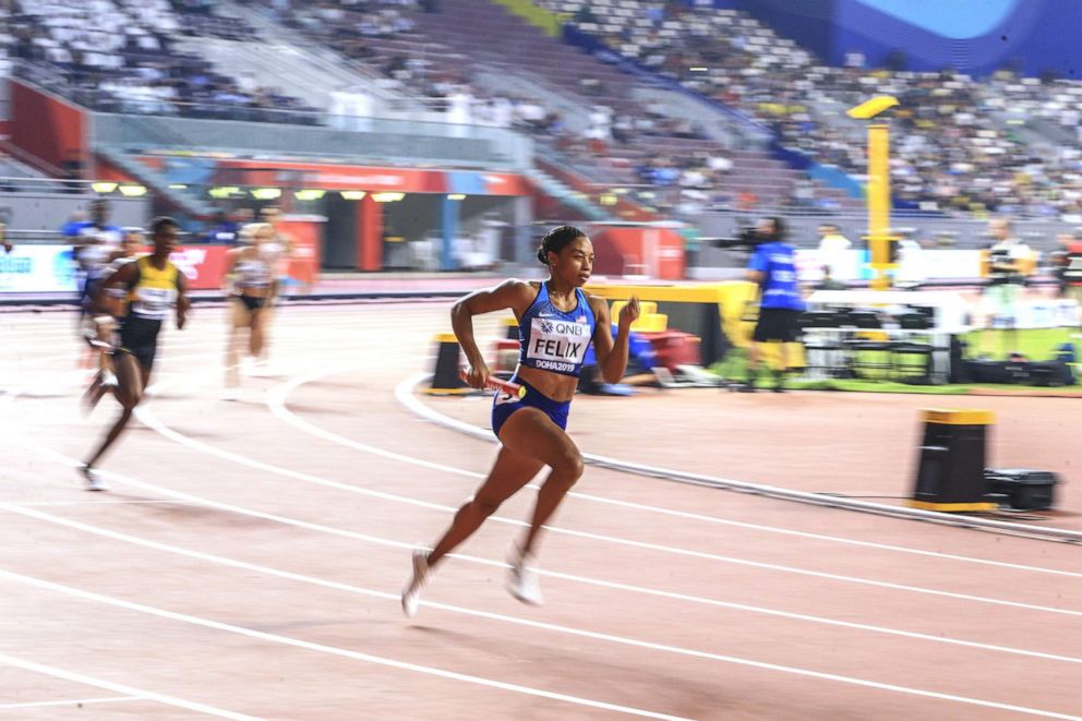 PHOTO: Allyson Felix from the U.S. competes in 4x400 meters mixed relay race final during the 17th World Athletics Championships in Doha, Qatar on Sept. 29, 2019.