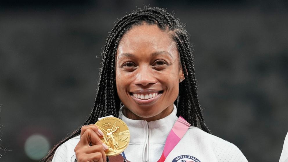 PHOTO: In this Aug. 7, 2021, file photo, Allyson Felix, of United States, poses with her gold medal for the women's 4 x 400-meter relay at the 2020 Summer Olympics, in Tokyo.