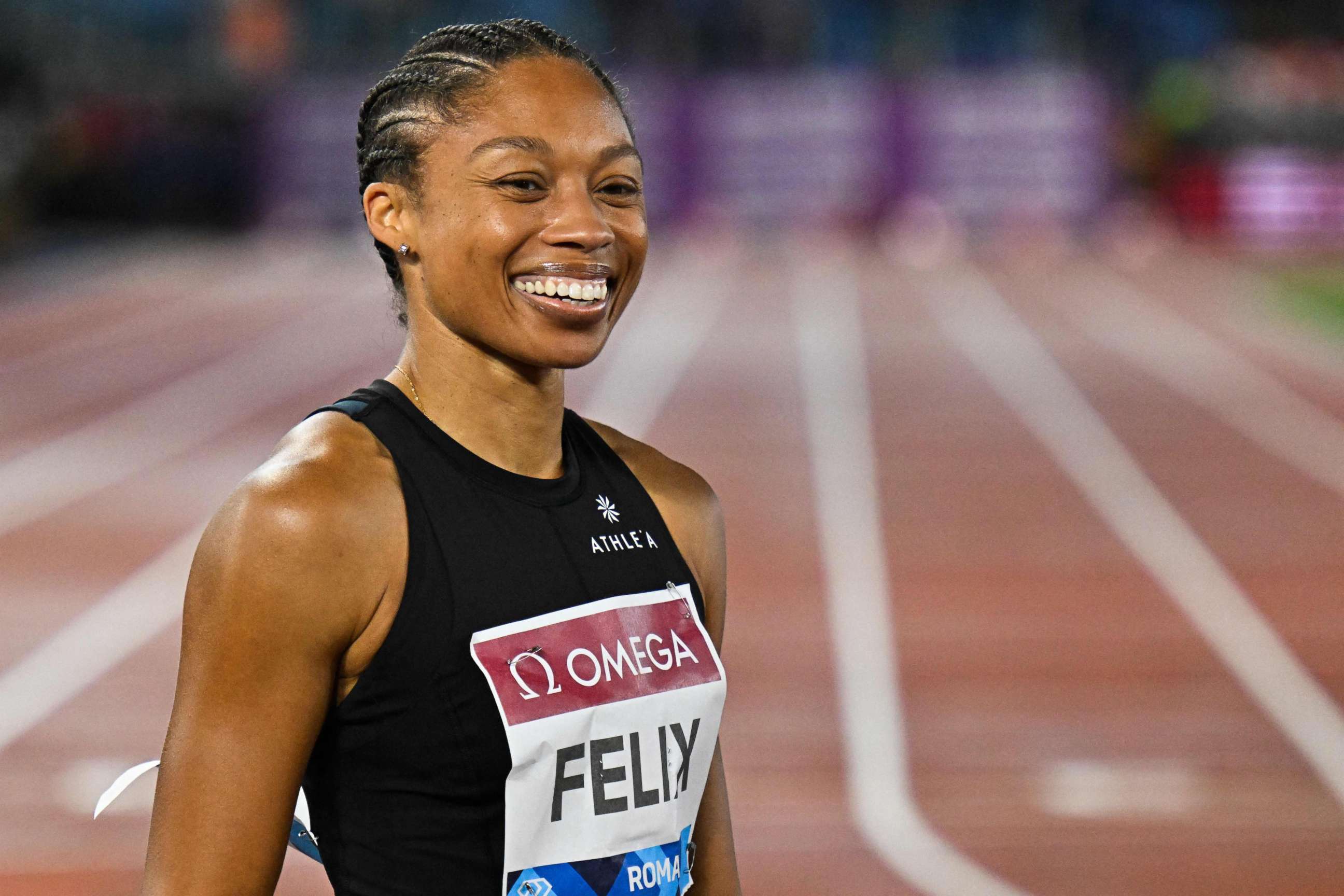 PHOTO: Allyson Felix reacts after placing 7th of the Women's 200m event, June 9, 2022, during the Wanda Diamond League athletics meeting at the Olympic Stadium in Rome.