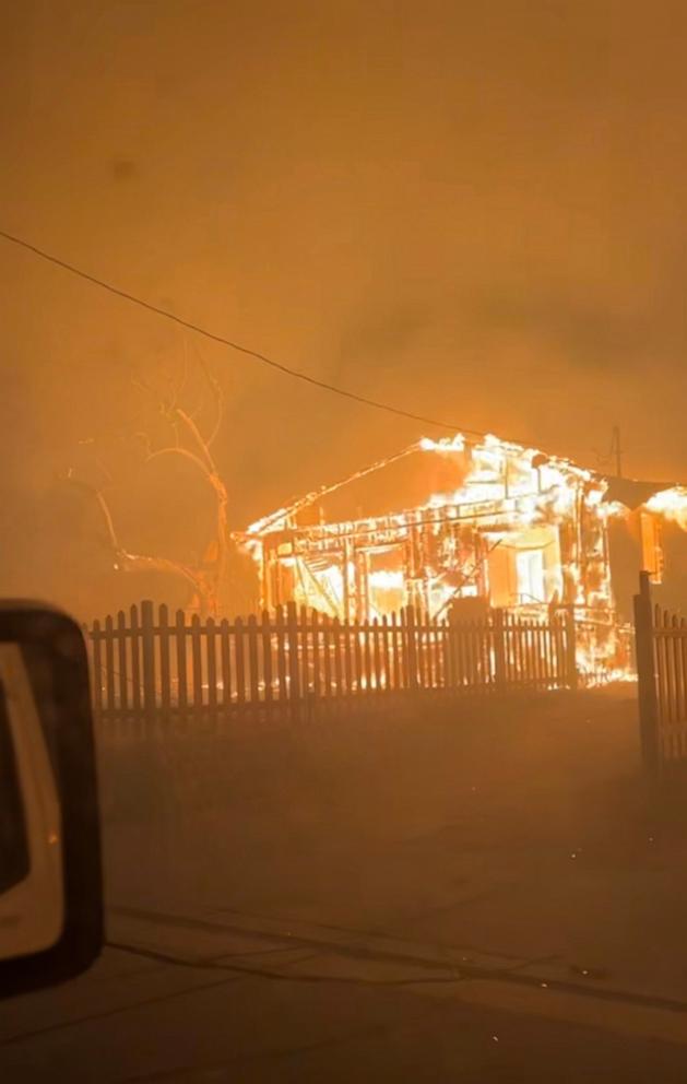 PHOTO: Chloe Garcia shared a photo of her house in Altadena, California on fire as a result of the Eaton Fire.