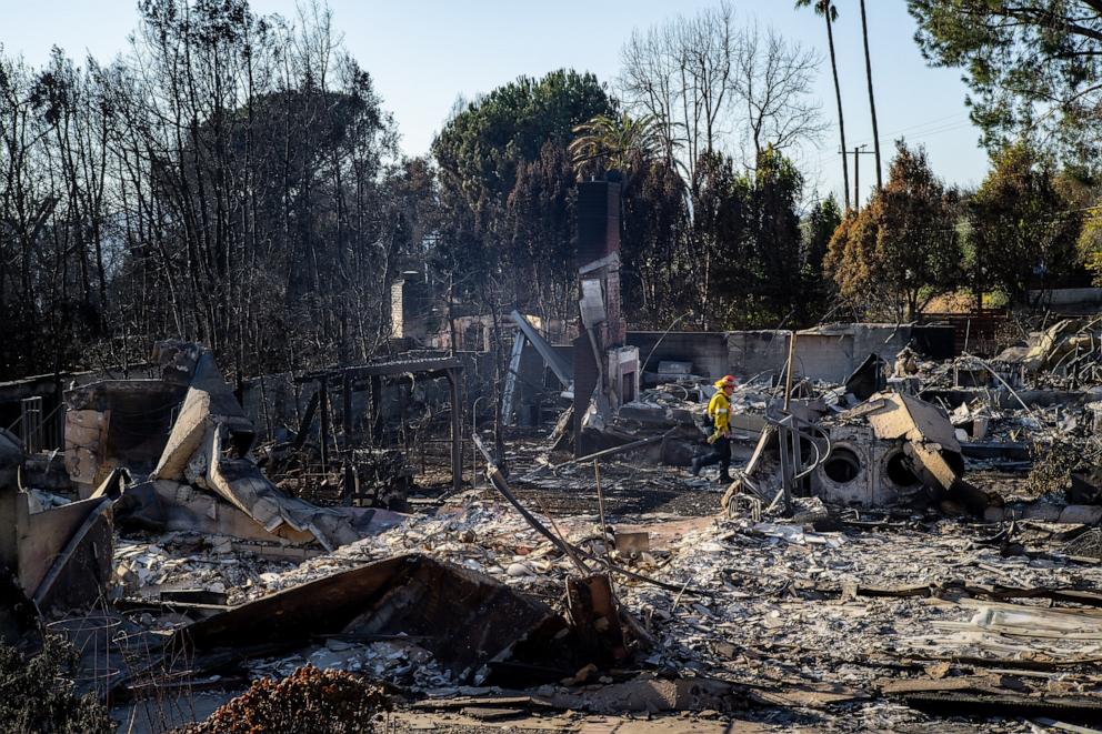 PHOTO: A First Responder assess a destroyed residence in Altadena, Calif., Jan. 16, 2025.