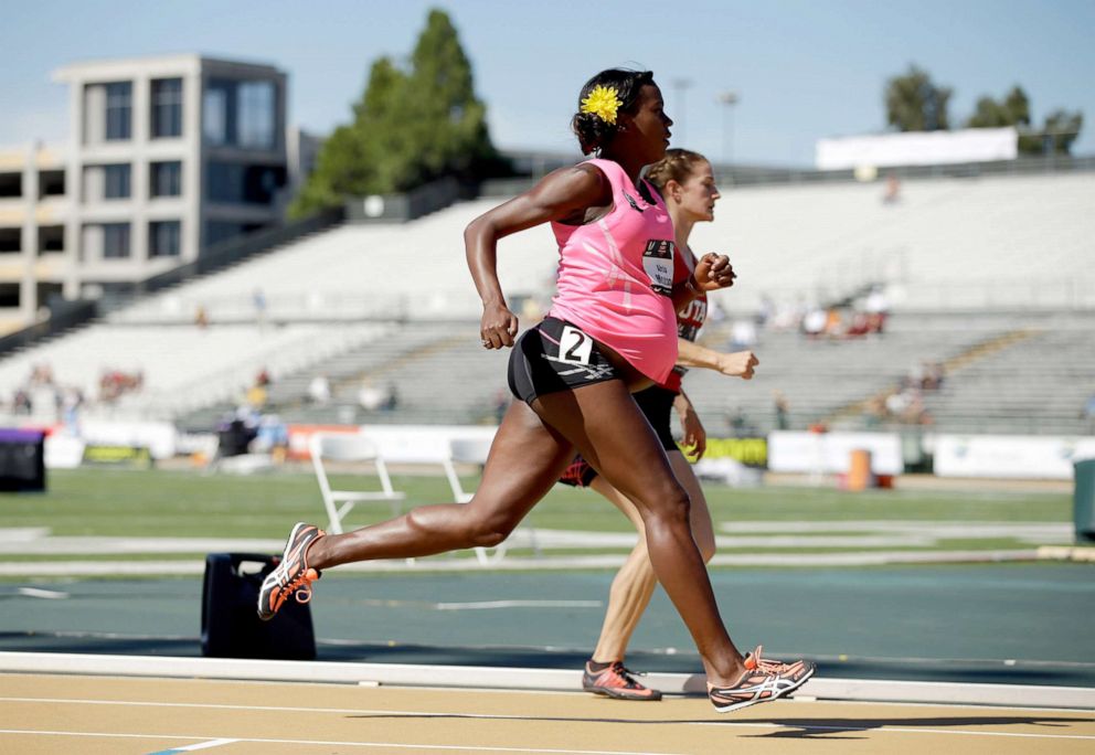 PHOTO: A pregnant Alysia Montano runs in the opening round of the womens 800 meter run during day 2 of the USATF Outdoor Championships at Hornet Stadium, June 26, 2014, in Sacramento, California.