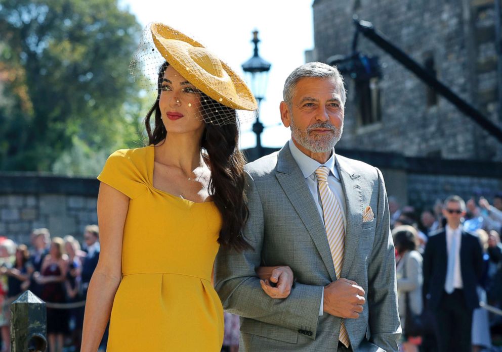 PHOTO: Amal Clooney and George Clooney arrive for the wedding ceremony of Prince Harry and Meghan Markle at St. George's Chapel at Windsor Castle in Windsor, near London, May 19, 2018.