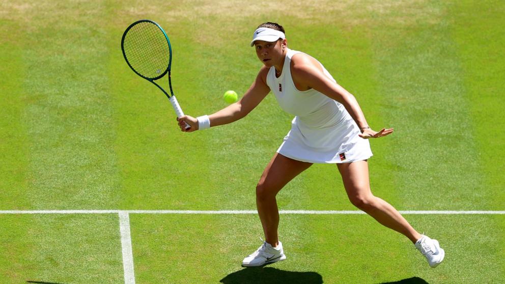 PHOTO: Amanda Anisimova of United States plays a forehand against Aryna Sabalenka during the Ladies' Singles semi-final on day eleven of The Championships Wimbledon 2025 at All England Lawn Tennis and Croquet Club, on July 10, 2025, in London.