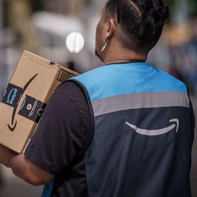 PHOTO: An Amazon messenger delivers a package in Manhattan, Sept. 16, 2023.