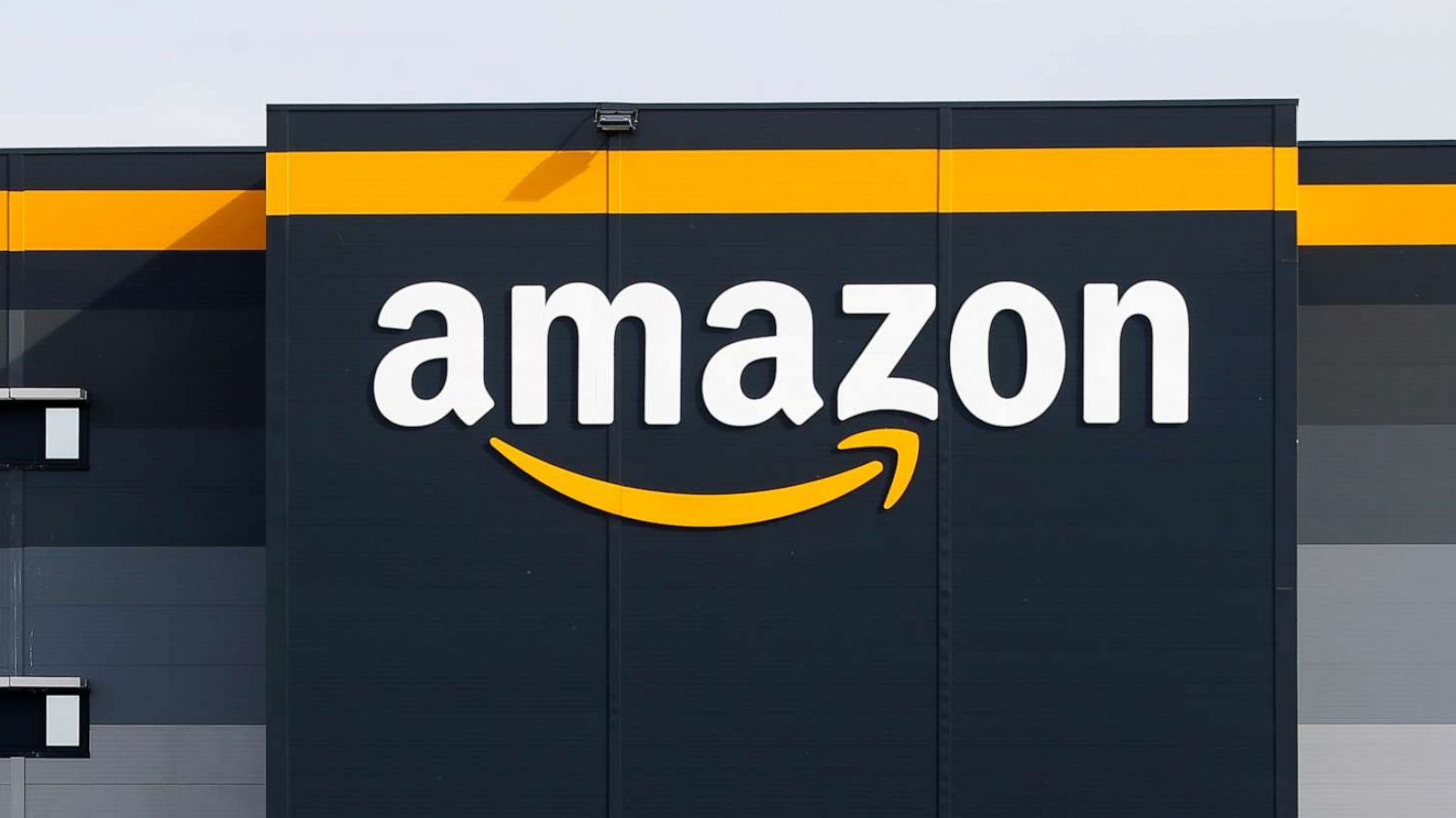 PHOTO: The Amazon logo is seen on the facade of a logistics center in France, April 21, 2020.