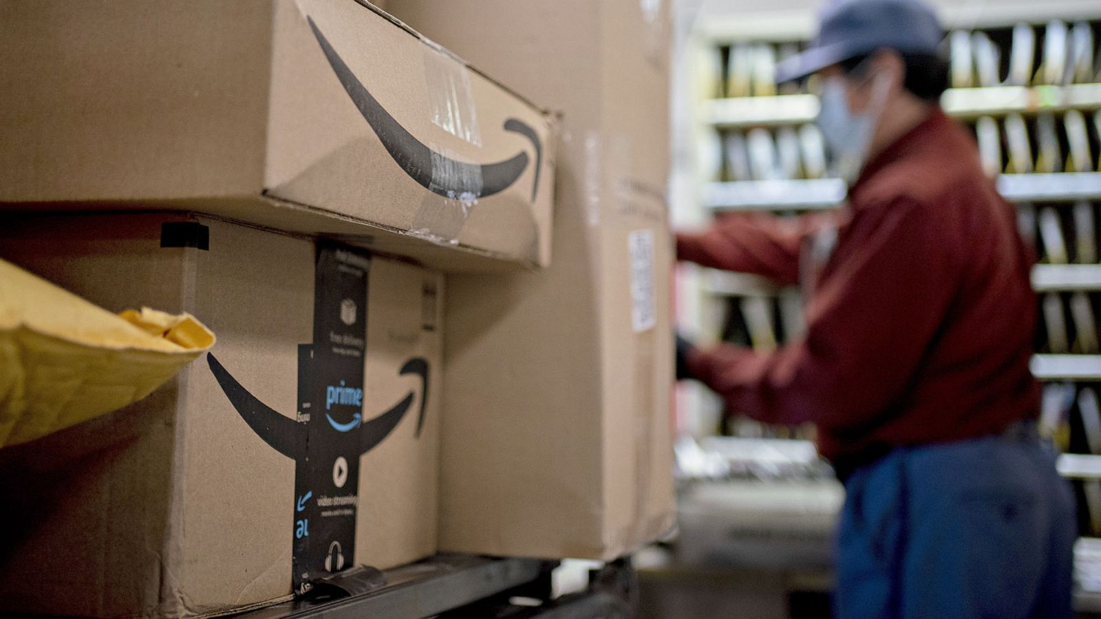 PHOTO: Amazon.com boxes sit at a United States Postal Service facility in Fairfax, Va., May 19, 2020.