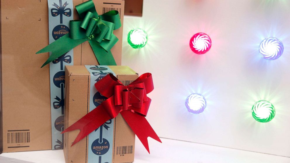 PHOTO: Amazon packages are decorated for the holidays.