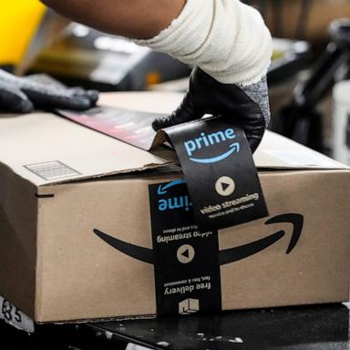 PHOTO: A wrker tapes up a box preparing an item to be shipped at the Amazon HOU6 Fulfillment Center, Nov. 27, 2023, in Richmond, Texas, 
