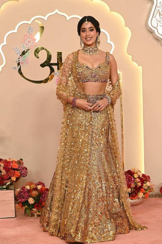 PHOTO: Bollywood actress Janhvi Kapoor poses for photos as she arrives at the wedding ceremony of Anant Ambani and Radhika Merchant, July 12, 2024, in Mumbai, India. 