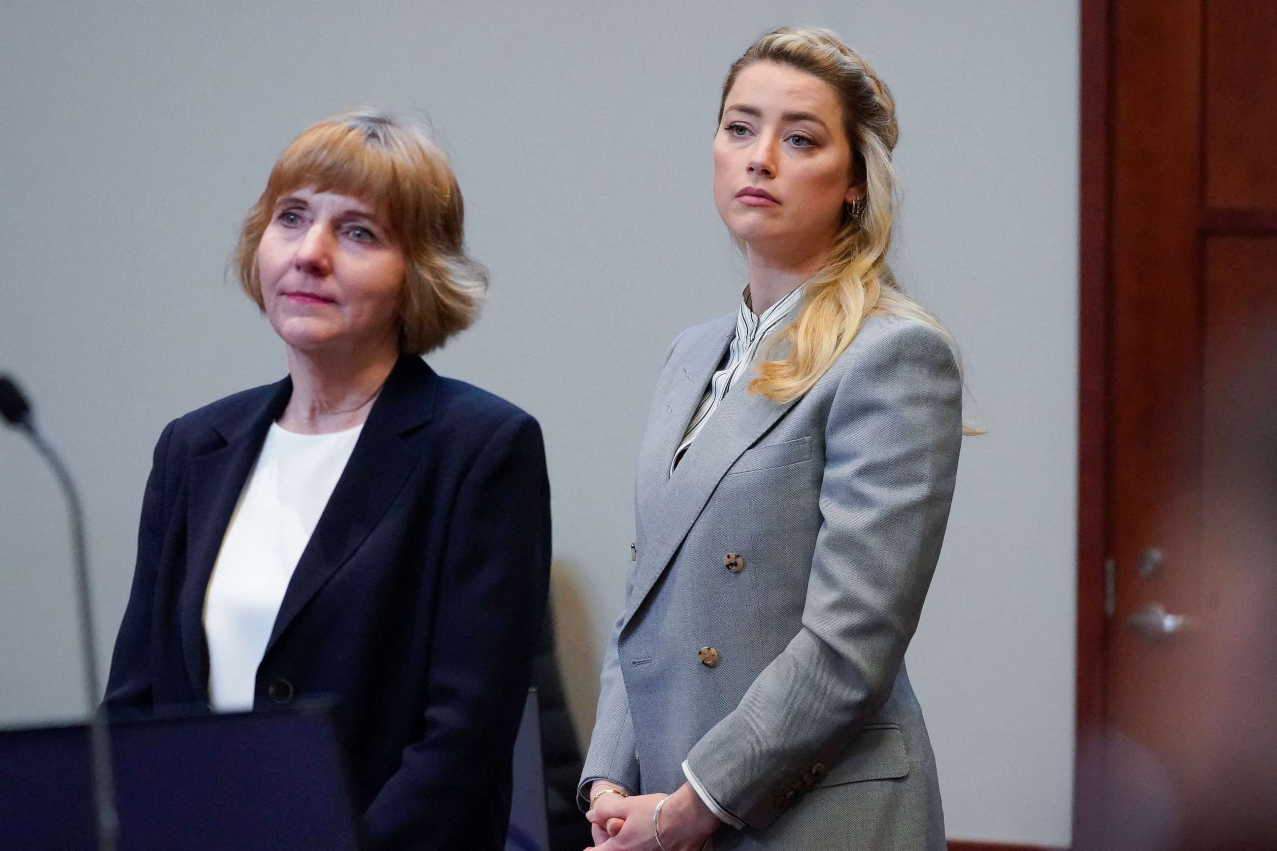 PHOTO: Actor Amber Heard stands with her attorney attorney Elaine Bredehoft before closing arguments in the Depp v. Heard trial at the Fairfax County Circuit Courthouse in Fairfax, Virginia, May 27, 2022.