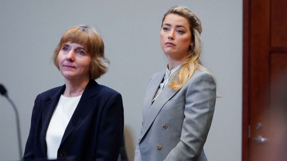 PHOTO: Actor Amber Heard stands with her attorney attorney Elaine Bredehoft before closing arguments in the Depp v. Heard trial at the Fairfax County Circuit Courthouse in Fairfax, Virginia, May 27, 2022.