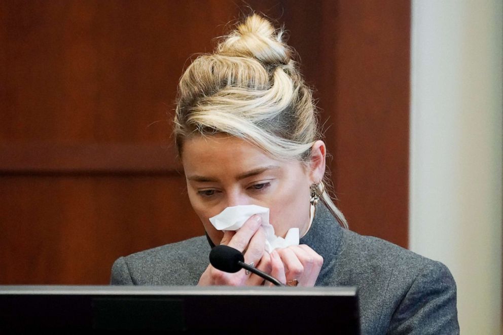 PHOTO: Actress Amber Heard testifies in the courtroom at the Fairfax County Circuit Courthouse in Fairfax, Va., on May 16, 2022.
