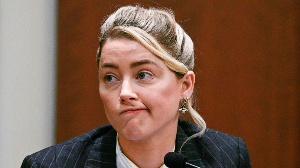 PHOTO: Actor Amber Heard testifies in the courtroom at the Fairfax County Circuit Courthouse in Fairfax, Va., Tuesday, May 17, 2022.