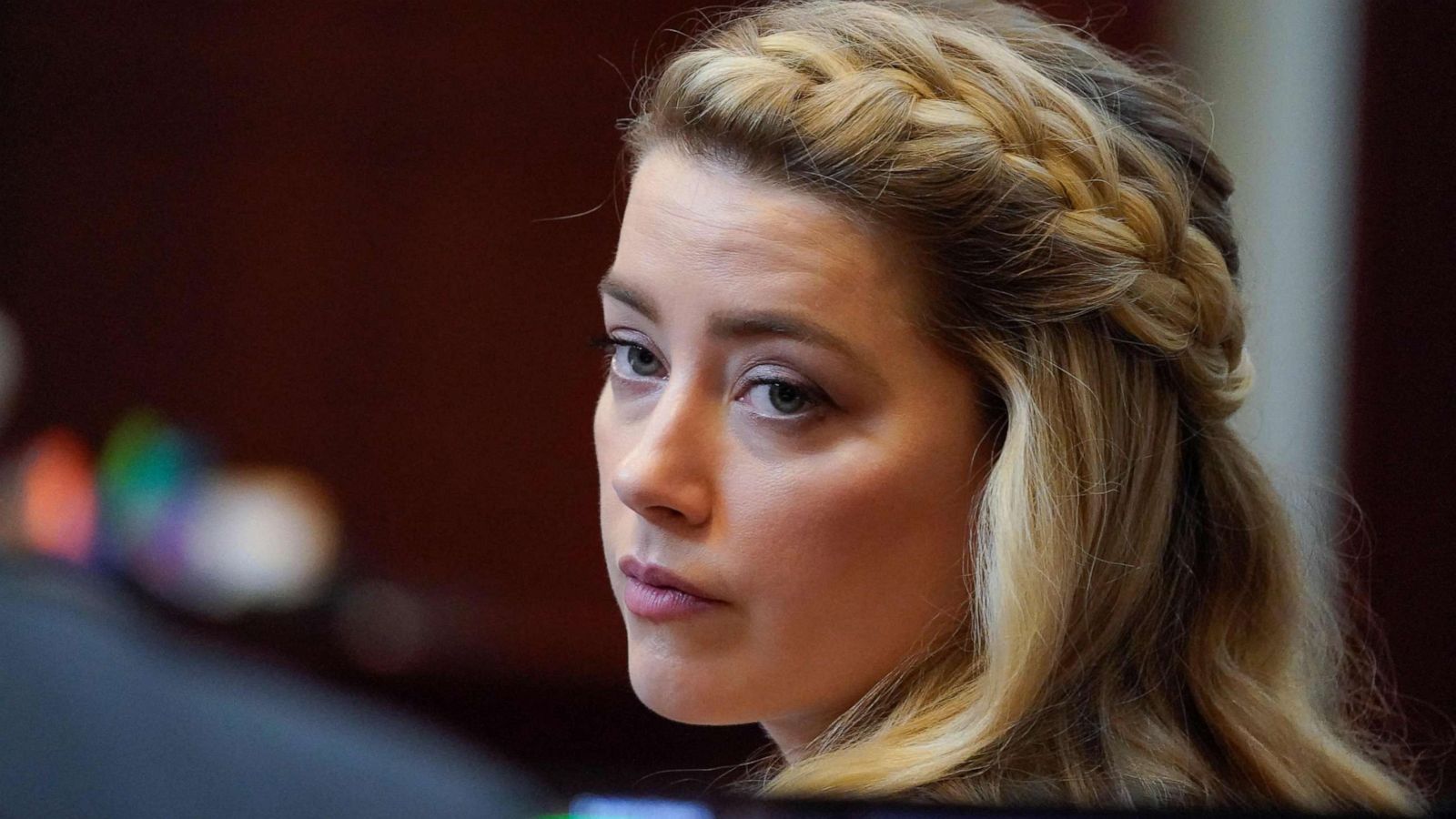 PHOTO: In this file photo taken on May 27, 2022, actor Amber Heard arrives for closing arguments in the Depp v. Heard trial at the Fairfax County Circuit Courthouse in Fairfax, Va.