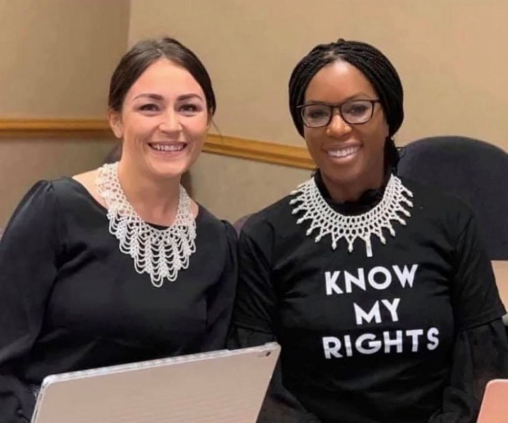 PHOTO: Amber Goodwin, right, poses with fellow 2021 law school graduate Kirsty Liedman.