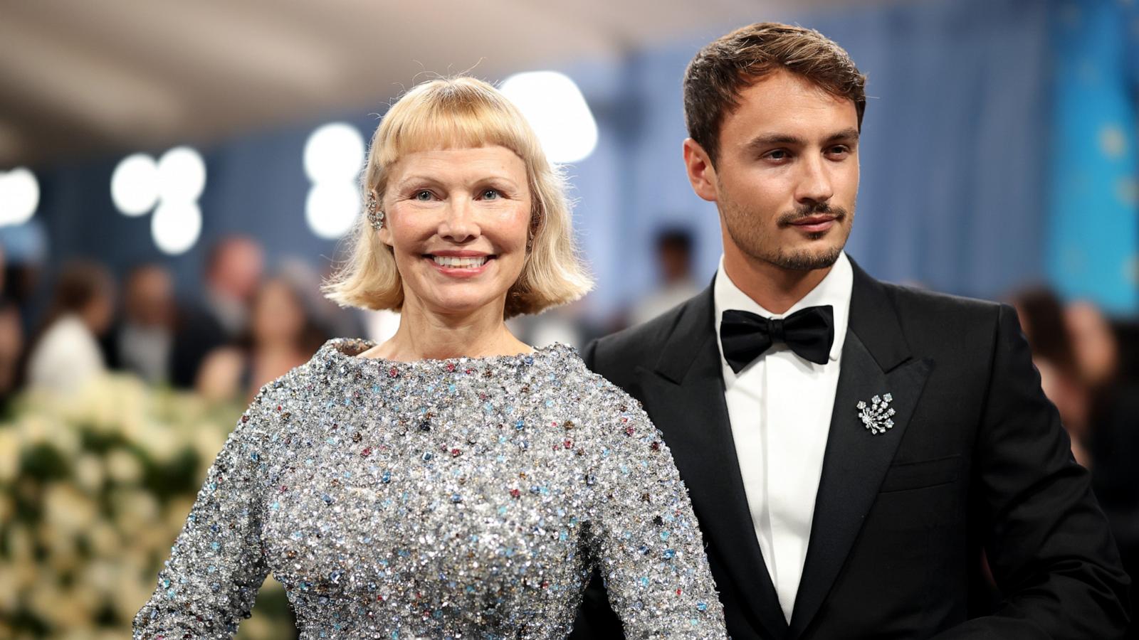 Pamela Anderson and Brandon Thomas Lee attend the 2025 Met Gala Celebrating "Superfine: Tailoring Black Style" on May 05, 2025 in New York City.