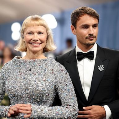 Pamela Anderson and Brandon Thomas Lee attend the 2025 Met Gala Celebrating "Superfine: Tailoring Black Style" on May 05, 2025 in New York City. 