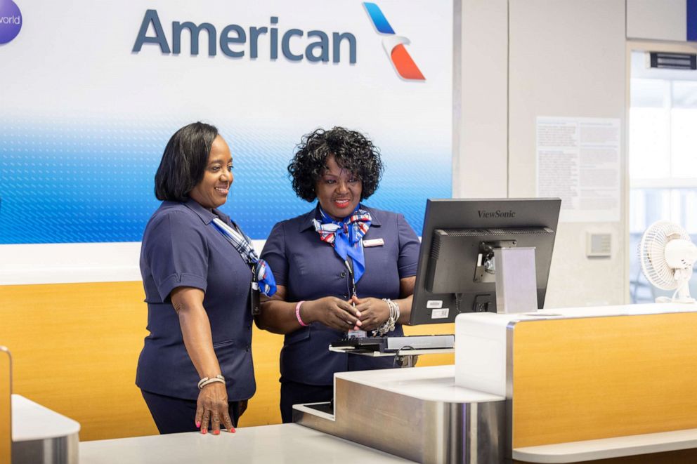 PHOTO: Counter staff that were part of an All-Black female crew that helped operate an American Airlines flight from Dallas to Phoenix paying tribute to trailblazer Bessie Coleman, who was the first Black woman to earn a pilot's license in 1921.