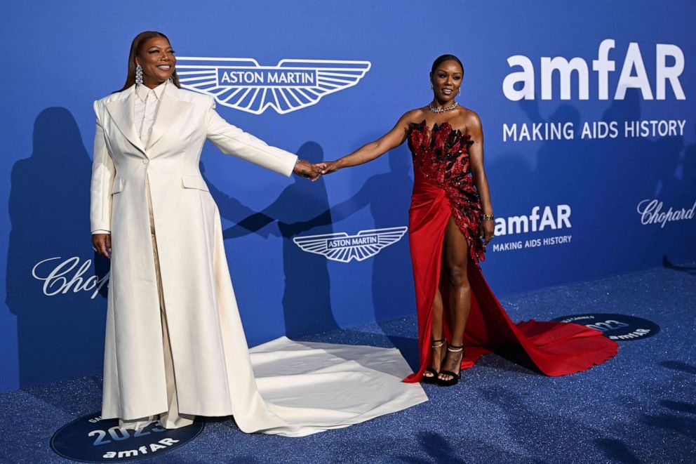 PHOTO: Queen Latifah and Eboni Nichols arrive to attend the annual amfAR Cinema Against AIDS Cannes Gala at the Hotel du Cap-Eden-Roc in Cap d'Antibes, southern France, on the sidelines of the 76th Cannes Film Festival, May 25, 2023.