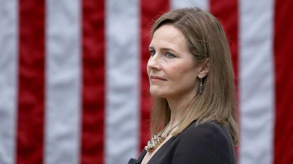 PHOTO: In this Sept. 26, 2020, file photo, Seventh U.S. Circuit Court Judge Amy Coney Barrett looks on during an event in the Rose Garden at the White House in Washington, D.C.