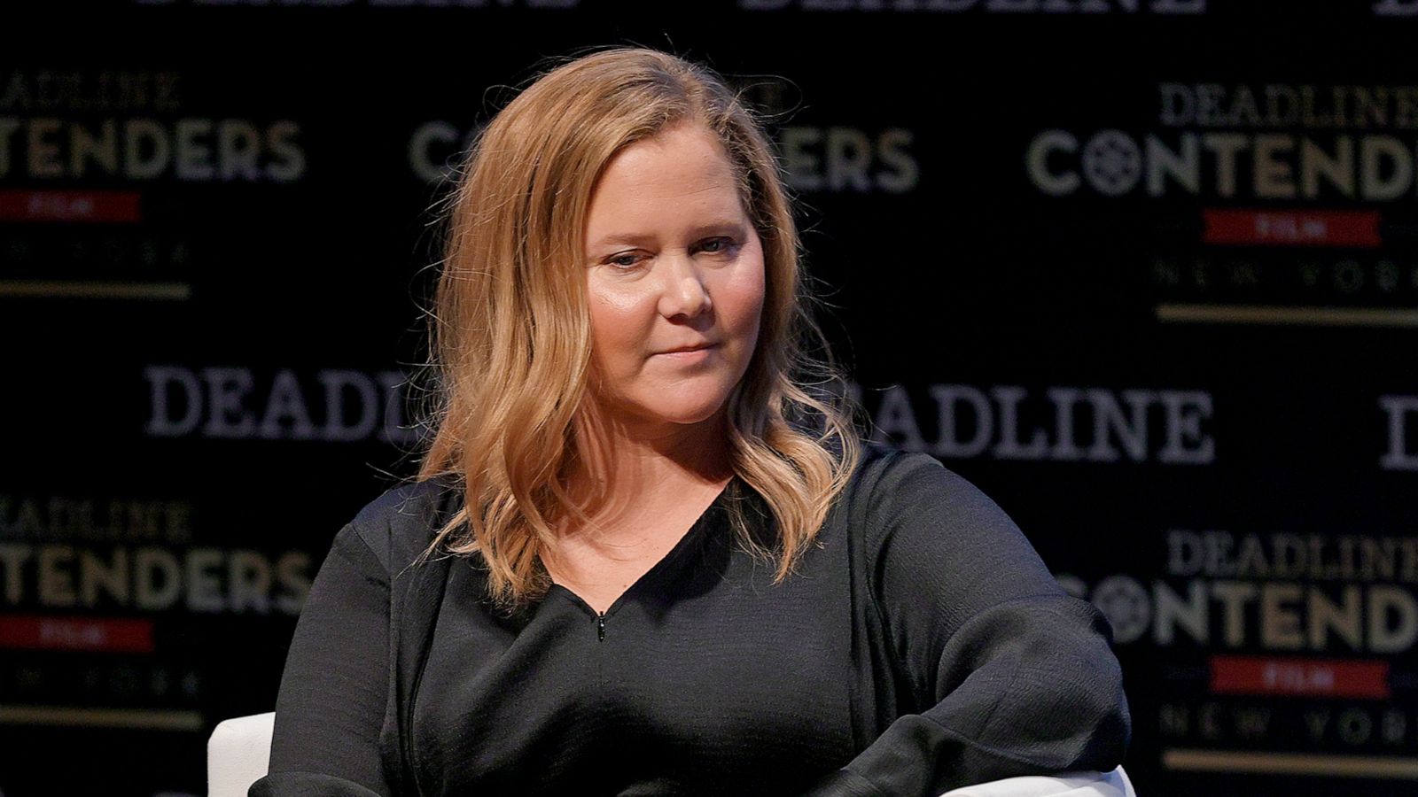 PHOTO: Actor Amy Schumer speaks onstage during A24's "The Humans" panel during Deadline Contenders Film: New York, Dec. 4, 2021, in New York City.