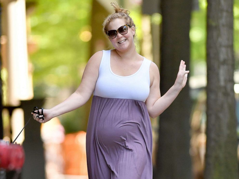 PHOTO: Amy Schumer dances in New York City on May 18, 2019.