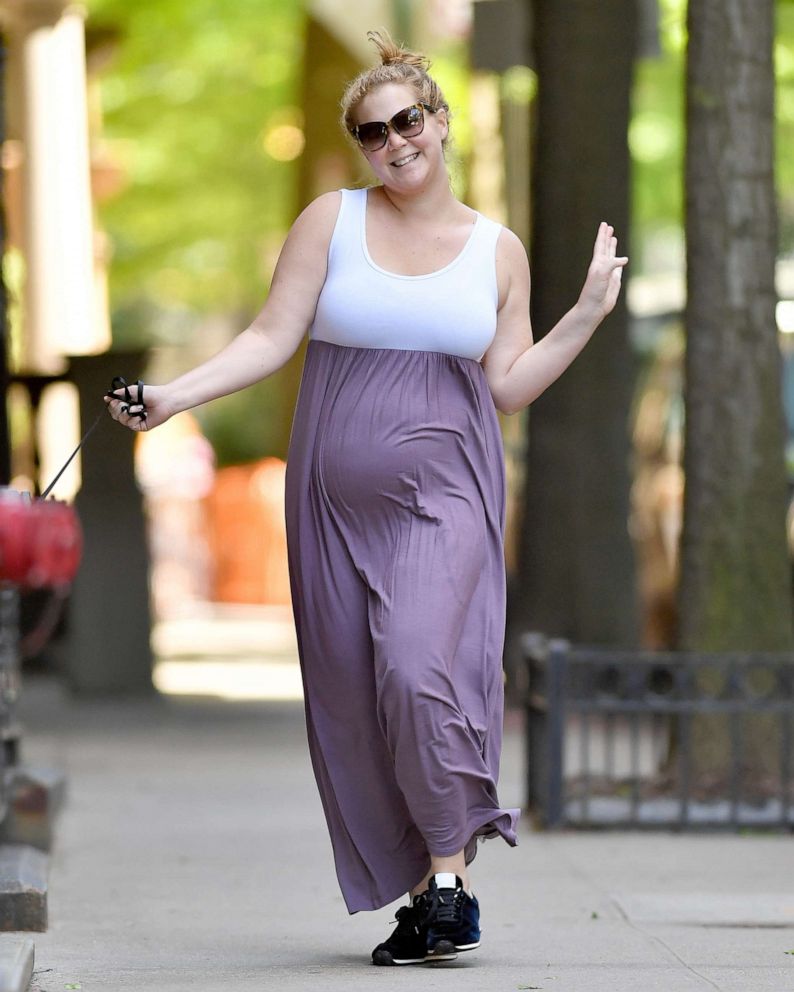 PHOTO: Amy Schumer dances  in New York City on May 18, 2019.