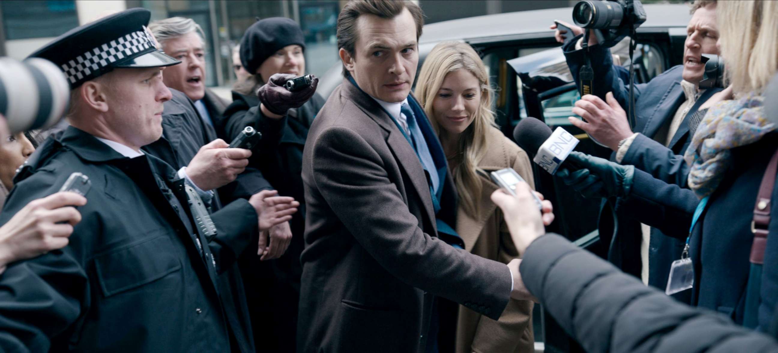 PHOTO: Sienna Miller and Rupert Friend appear in Anatomy of a Scandal.