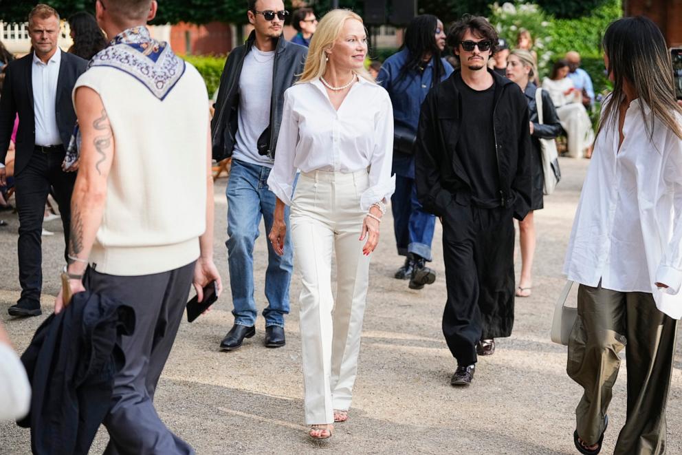 PHOTO: Dylan Lee Jagger, Pamela Anderson and Brandon Thomas Lee attend the ROTATE show during Copenhagen Fashion Week on Aug. 8, 2024 in Copenhagen.