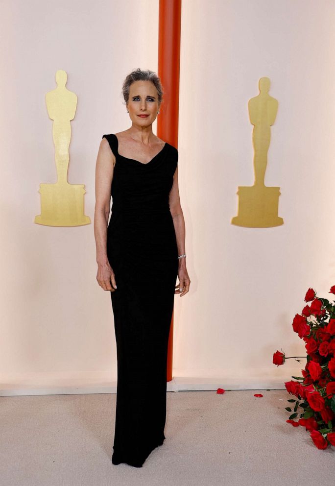 PHOTO: Andie MacDowell poses on the champagne-colored red carpet during the Oscars arrivals at the 95th Academy Awards in Hollywood, Calif., March 12, 2023.