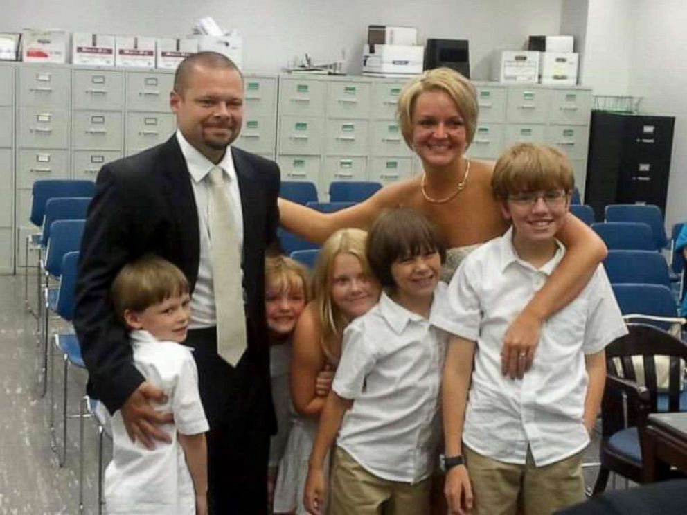 PHOTO: Angela Hertenstein poses with her husband and their combined five children.